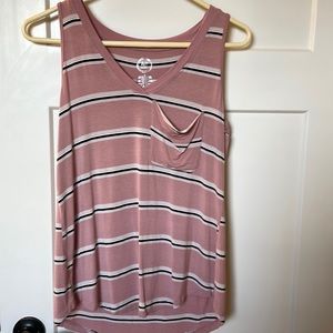 Maurice’s tank top.